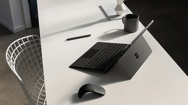 Surface Pro and mouse on a desk